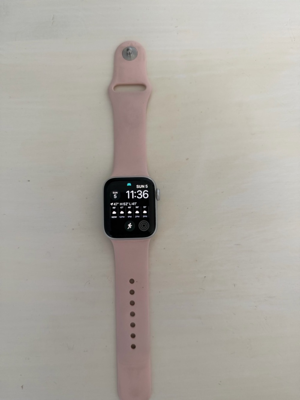Apple Watch SE (1st generation) with Pink Silicone Band & white band